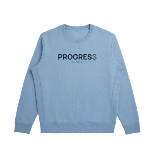 Front view of the Cloudy Blue Minimal Progress Sweatshirt with navy PROGRESS lettering, an outlined final S, and CHAPTER 01 text.